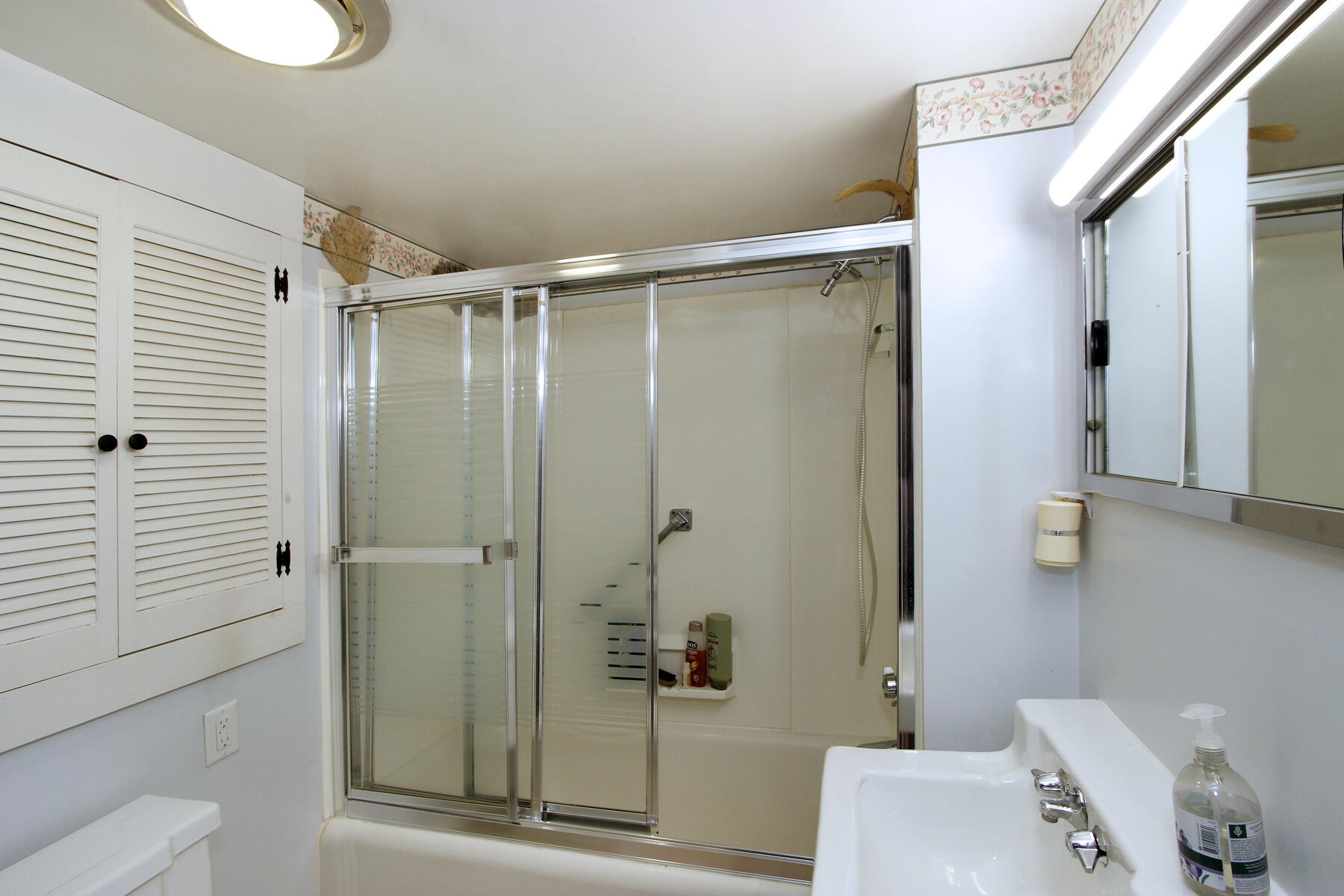 958 Long Pond Road Brewster, MA 02631 - Photo 17 of 38 a bathroom with a shower and a sink