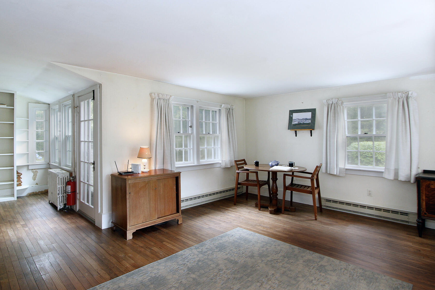 958 Long Pond Road Brewster, MA 02631 - Photo 19 of 38 a living room with furniture and a window