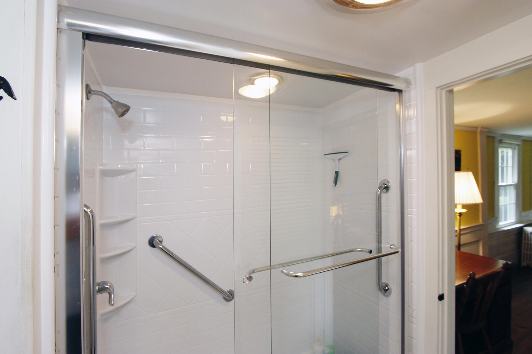 958 Long Pond Road Brewster, MA 02631 - Photo 24 of 38 a bathroom with a shower and a mirror