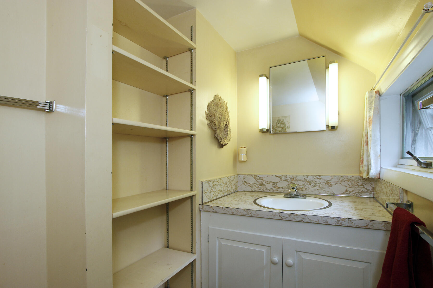 958 Long Pond Road Brewster, MA 02631 - Photo 30 of 38 a bathroom with a granite countertop sink and a mirror