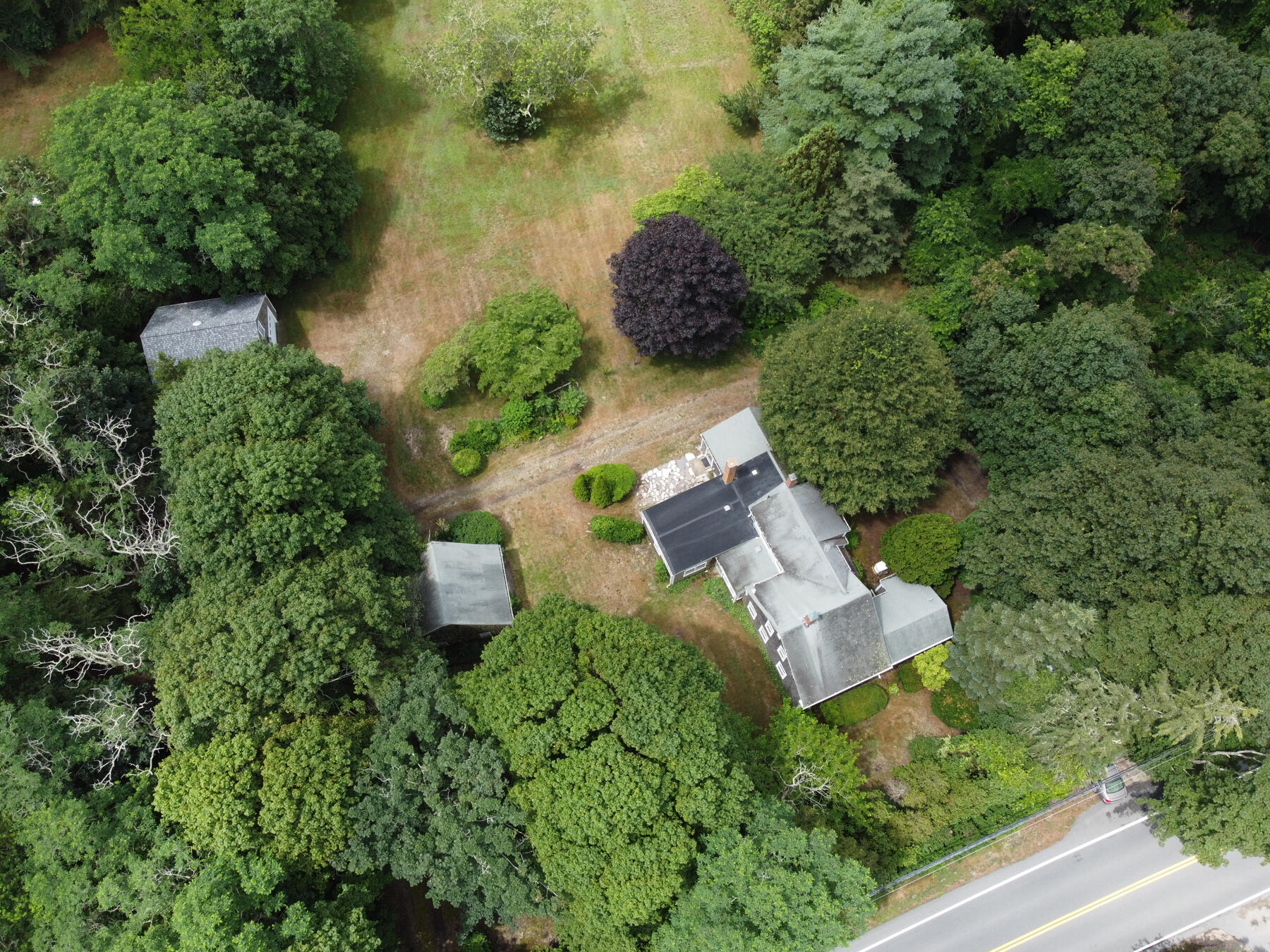 958 Long Pond Road Brewster, MA 02631 - Photo 34 of 38 an aerial view of a house with a yard