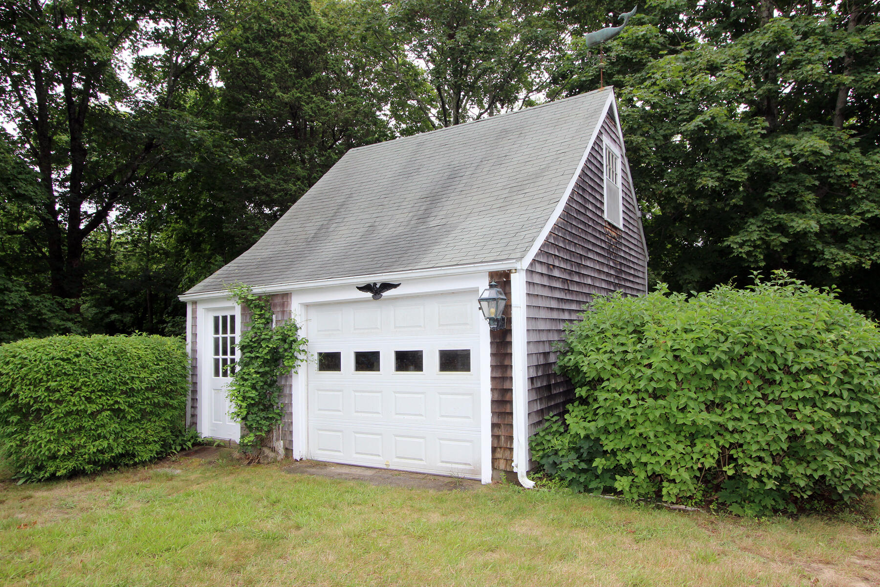 958 Long Pond Road Brewster, MA 02631 - Photo 5 of 38 a view of a house with a yard