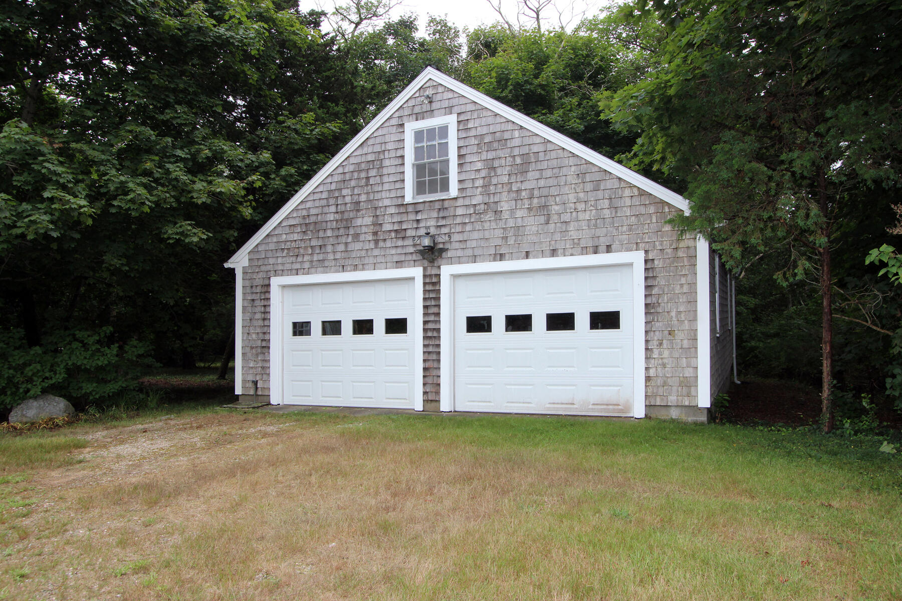 958 Long Pond Road Brewster, MA 02631 - Photo 6 of 38 a view of a house with backyard and garden