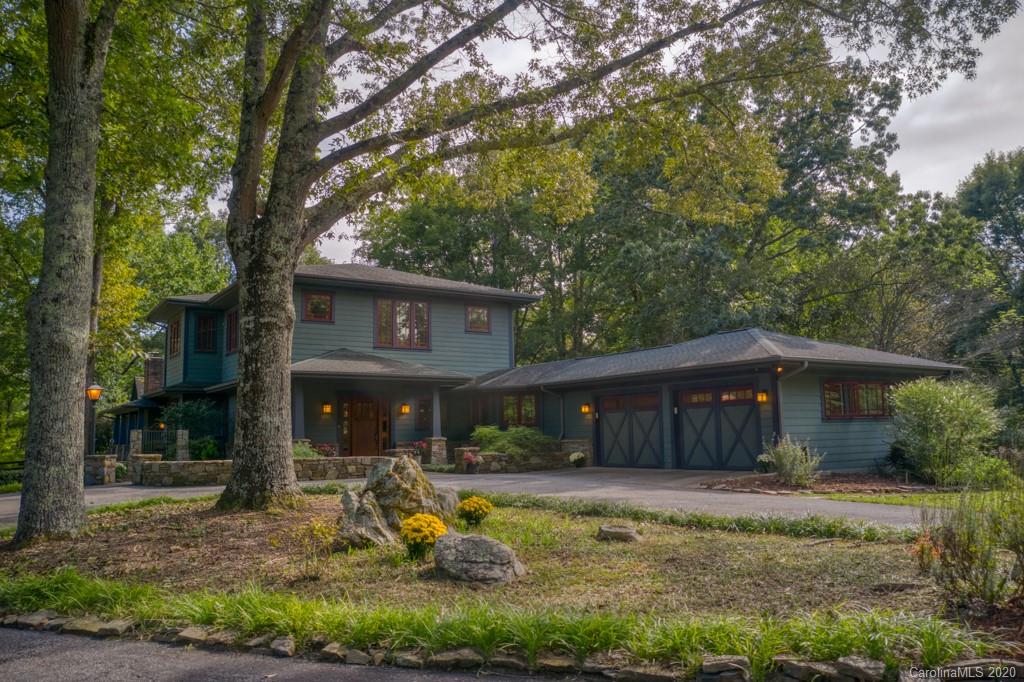305 Misty Hill Road Columbus, NC 28722 - Photo 1 of 46 front view of a house with a yard