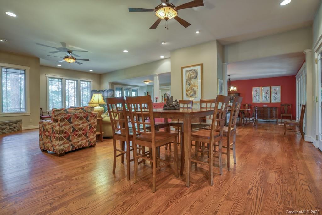 305 Misty Hill Road Columbus, NC 28722 - Photo 14 of 46 a view of a dining room with furniture window and wooden floor