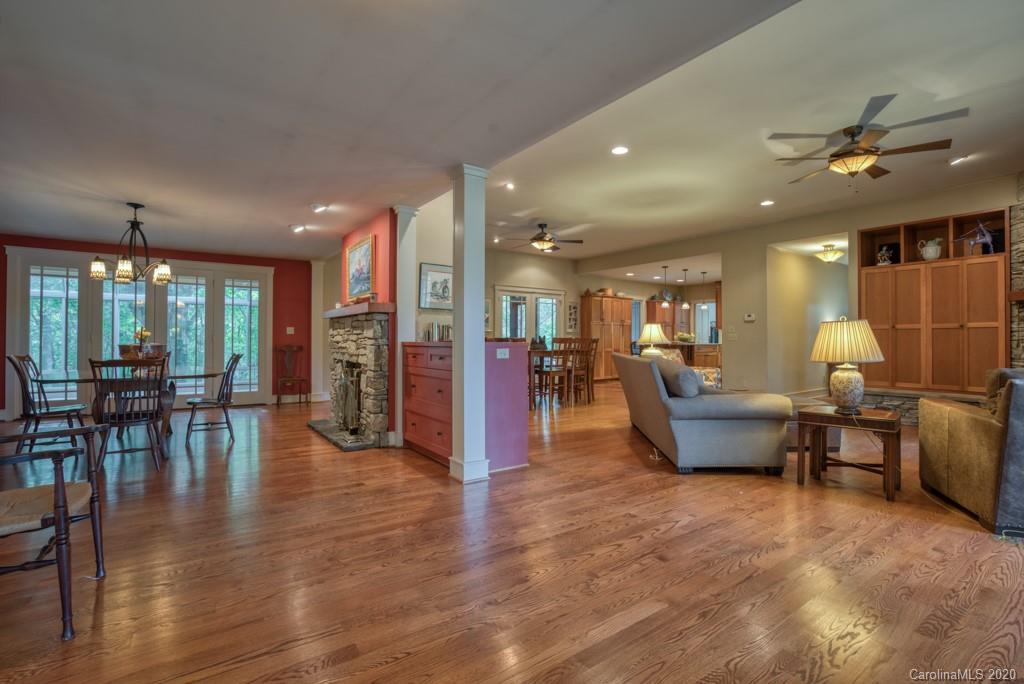 305 Misty Hill Road Columbus, NC 28722 - Photo 19 of 46 a view of a dining area with furniture window and wooden floor