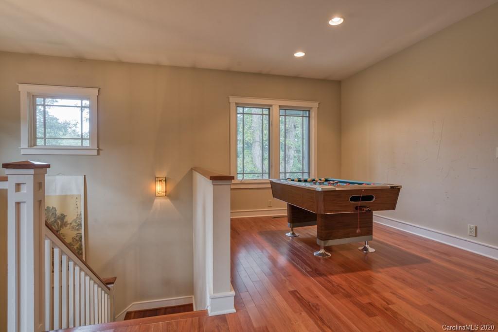 305 Misty Hill Road Columbus, NC 28722 - Photo 32 of 46 a living room with furniture and a wooden floor