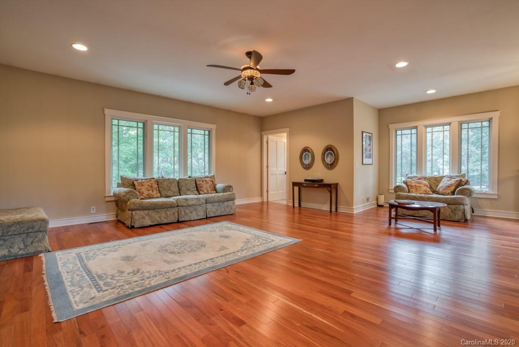 305 Misty Hill Road Columbus, NC 28722 - Photo 33 of 46 a living room with furniture and a wooden floor
