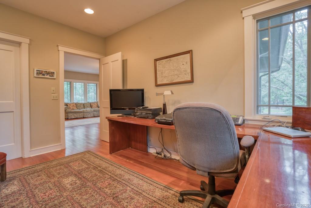305 Misty Hill Road Columbus, NC 28722 - Photo 35 of 46 a workspace with furniture and a window
