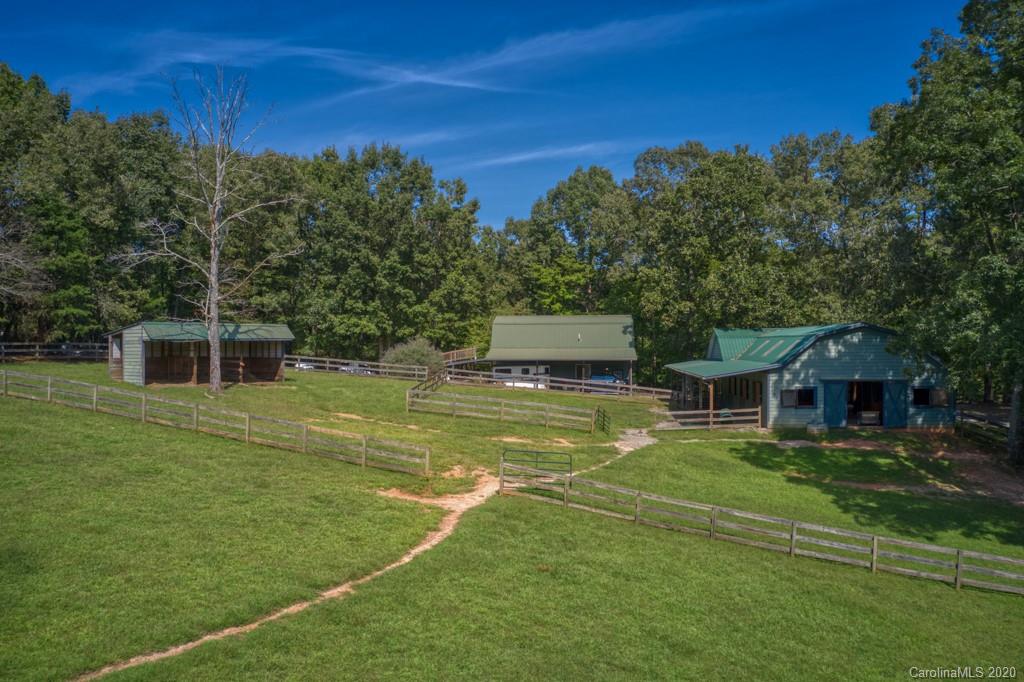 305 Misty Hill Road Columbus, NC 28722 - Photo 39 of 46 a view of a house with a big yard