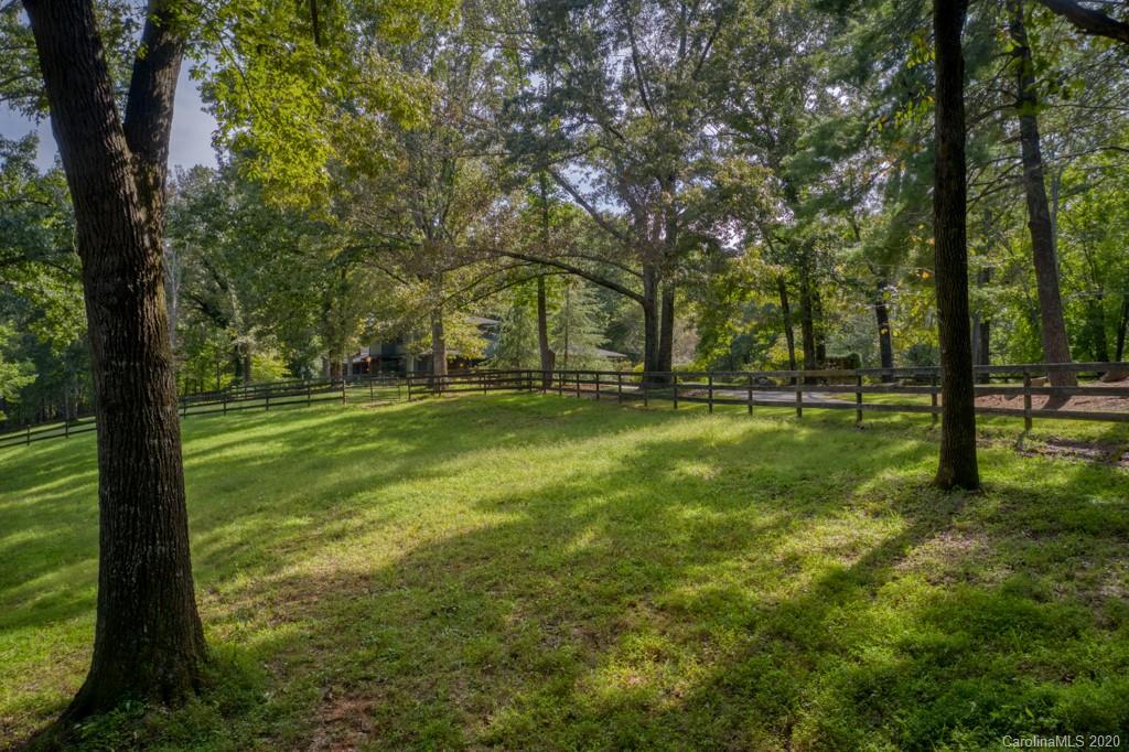 305 Misty Hill Road Columbus, NC 28722 - Photo 6 of 46 a backyard of a house with lots of green space