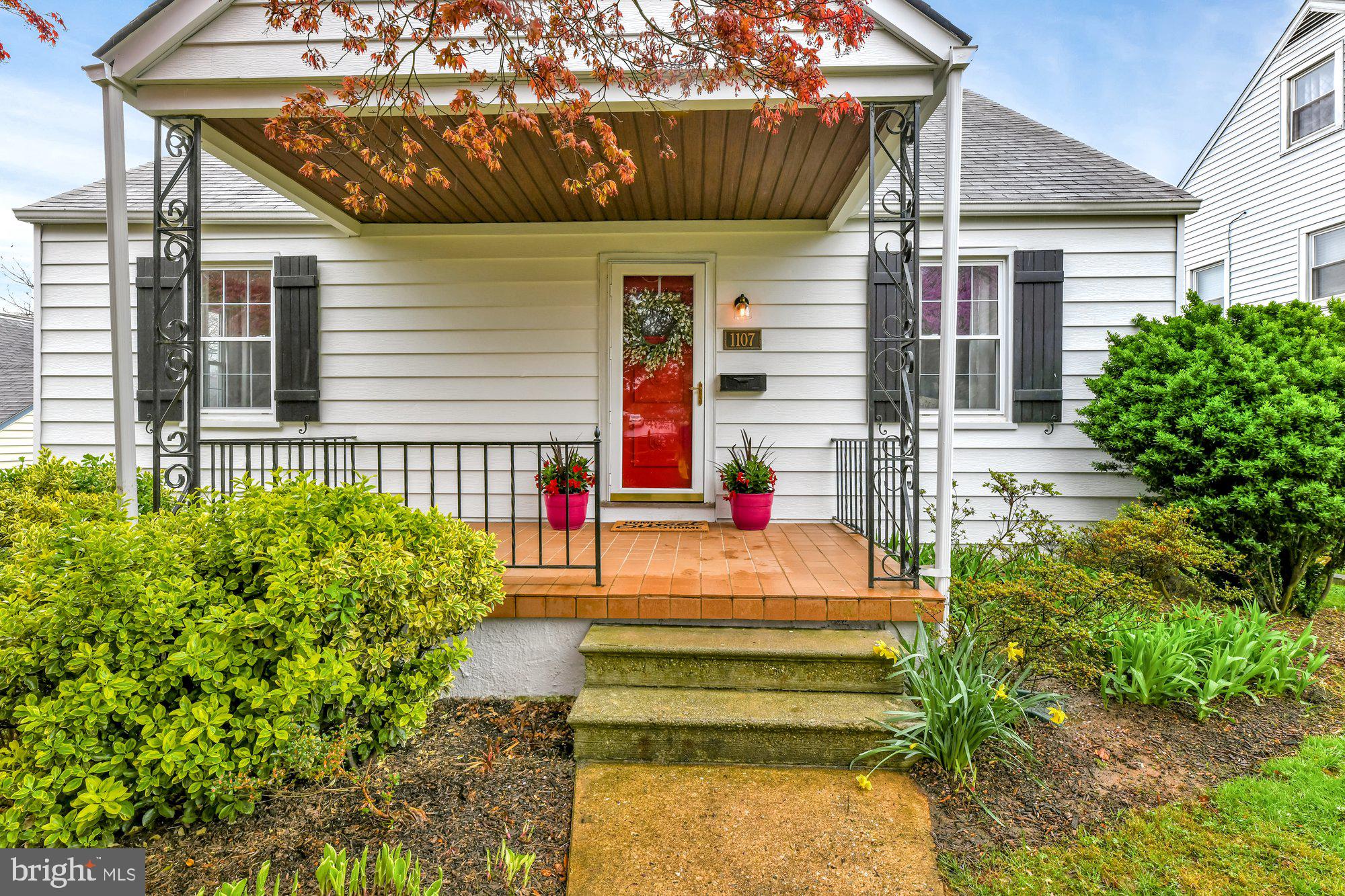 1107 Arran Road Baltimore, MD 21239 - Photo 2 of 29 a house view with a backyard and garden