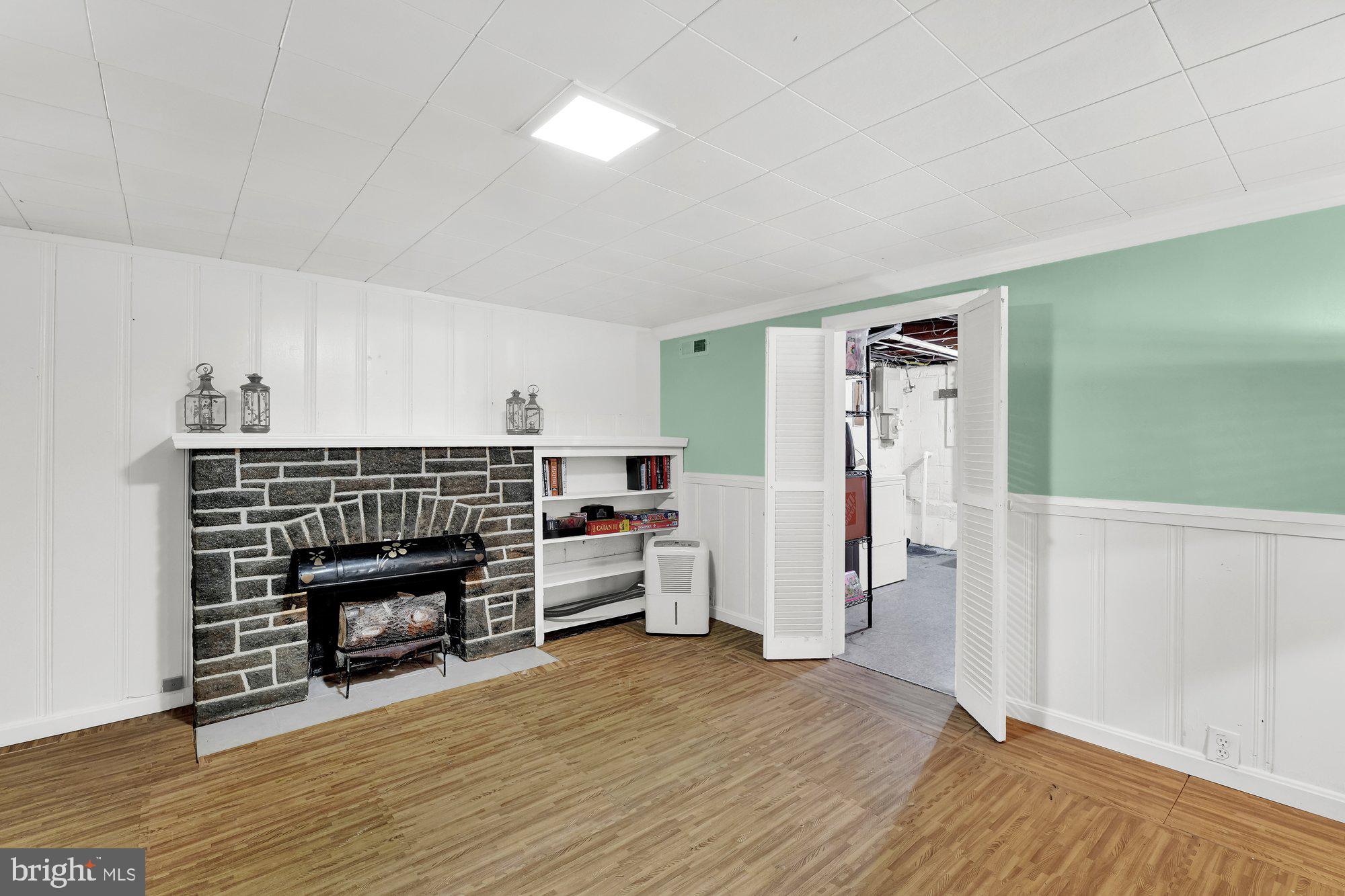 1107 Arran Road Baltimore, MD 21239 - Photo 25 of 29 a view of a livingroom with furniture and an empty room