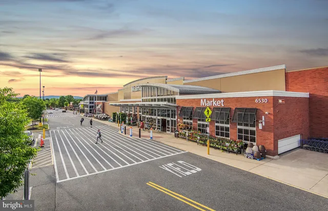 an outdoor space with lots of fruit and vegetables