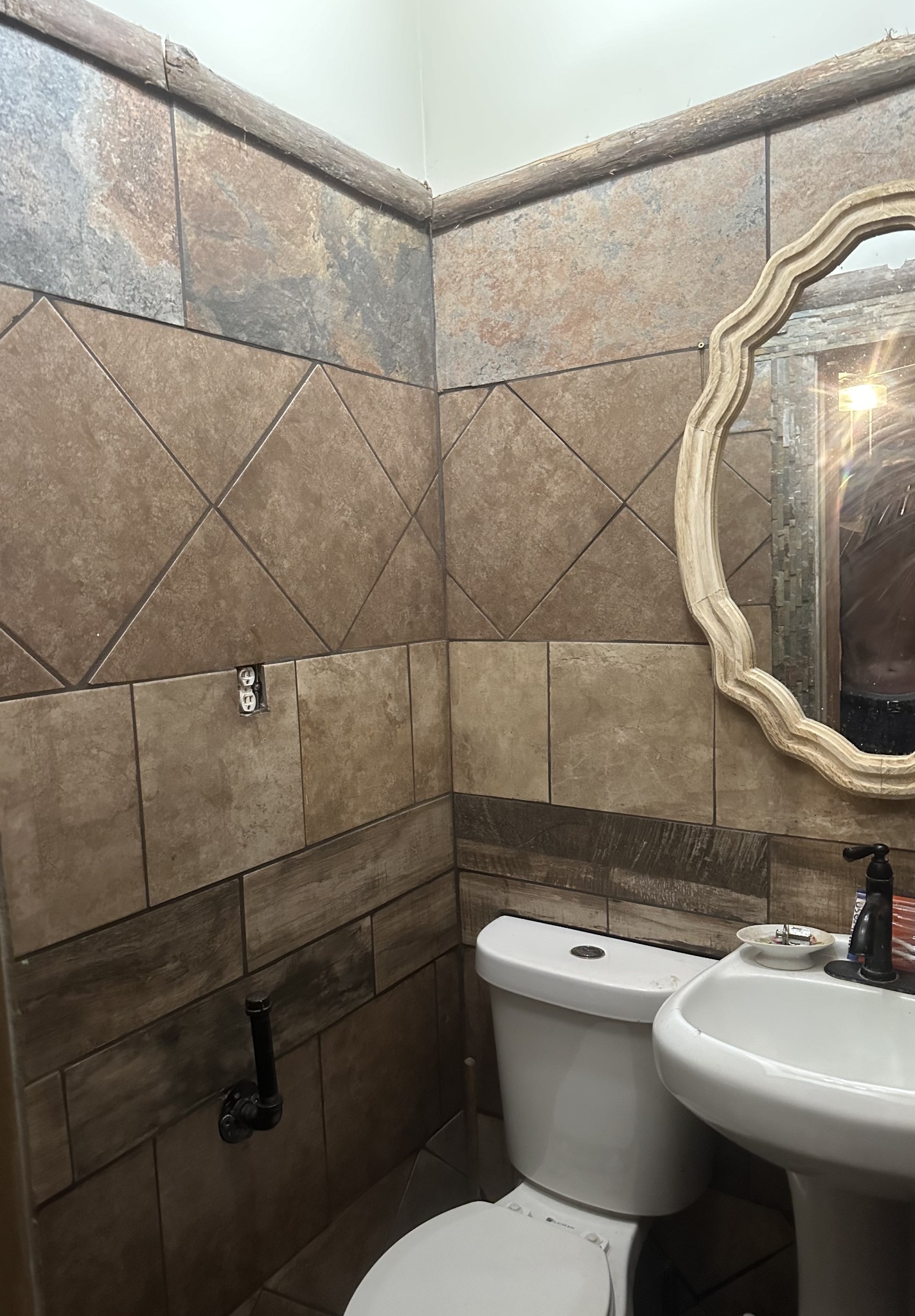555 Myrick Branch Road Pulaski, TN 38478 - Photo 40 of 40 a bathroom with a sink a toilet and a mirror