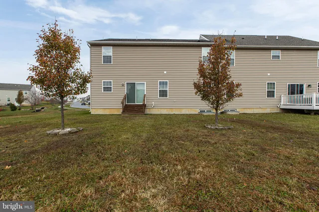 a view of a field with an ocean