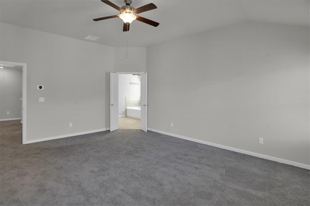 1506 Ashbrooke Trace Stone Mountain, GA 30083 - Photo 24 of 54 a view of an empty room