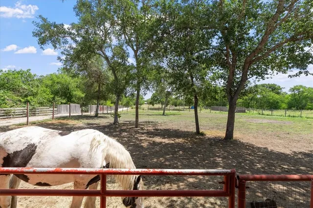 a view of a park with swings