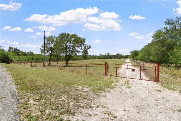 a view of a lake with a big yard