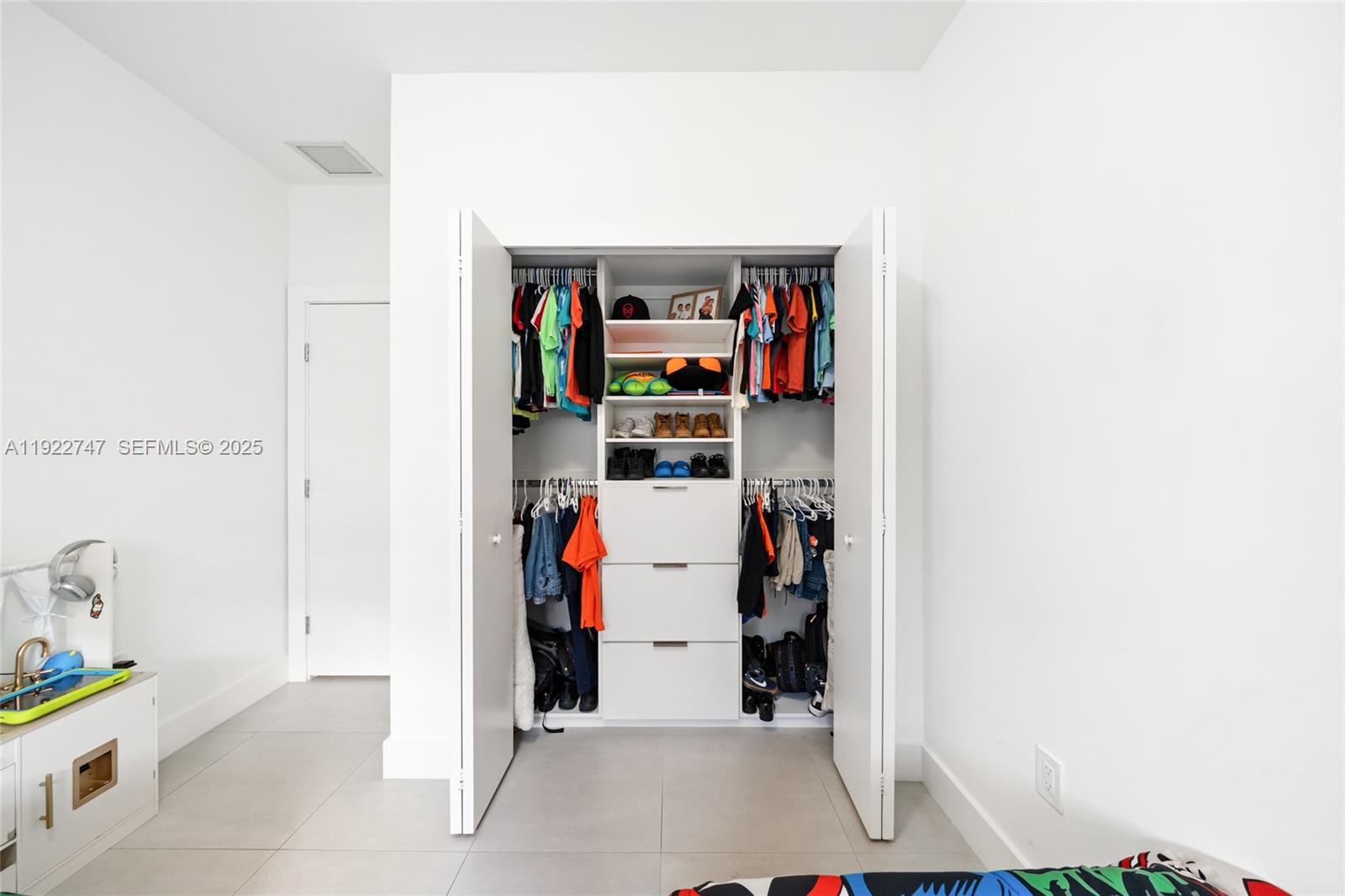 17341 Southwest 304th Street Homestead, FL 33030 - Photo 21 of 25 a room with storage and utility