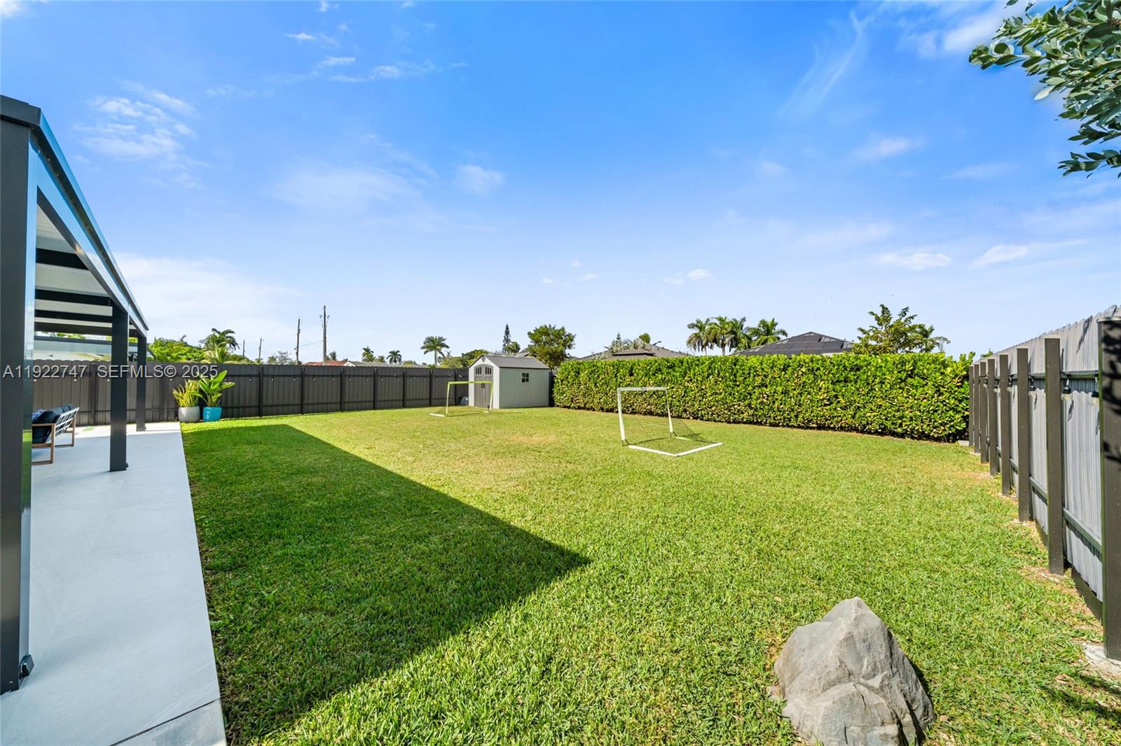 17341 Southwest 304th Street Homestead, FL 33030 - Photo 23 of 25 a view of a golf course with a garden