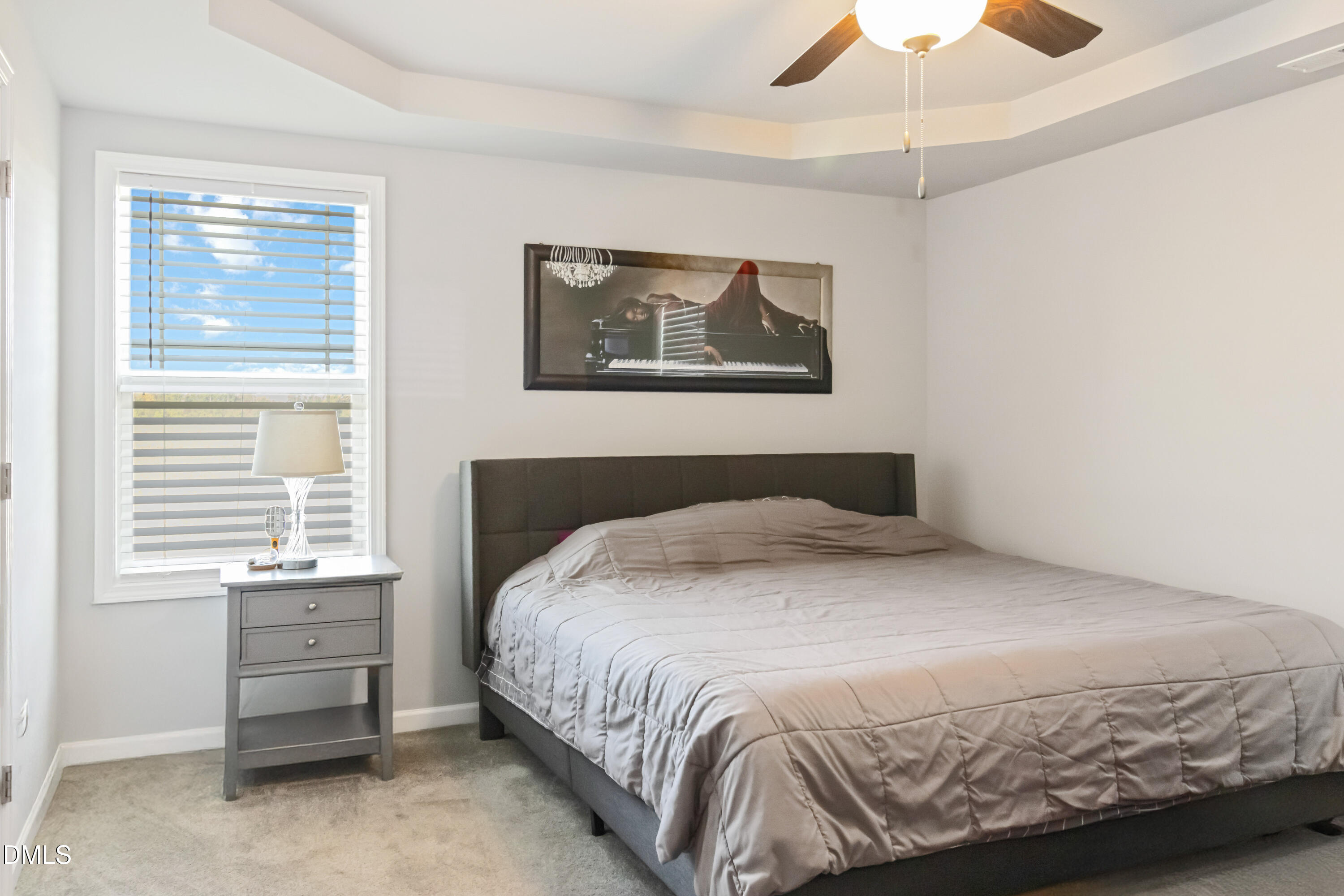 719 New Daniels Chapel Road Fremont, NC 27830 - Photo 11 of 24 a bedroom with a bed and a window