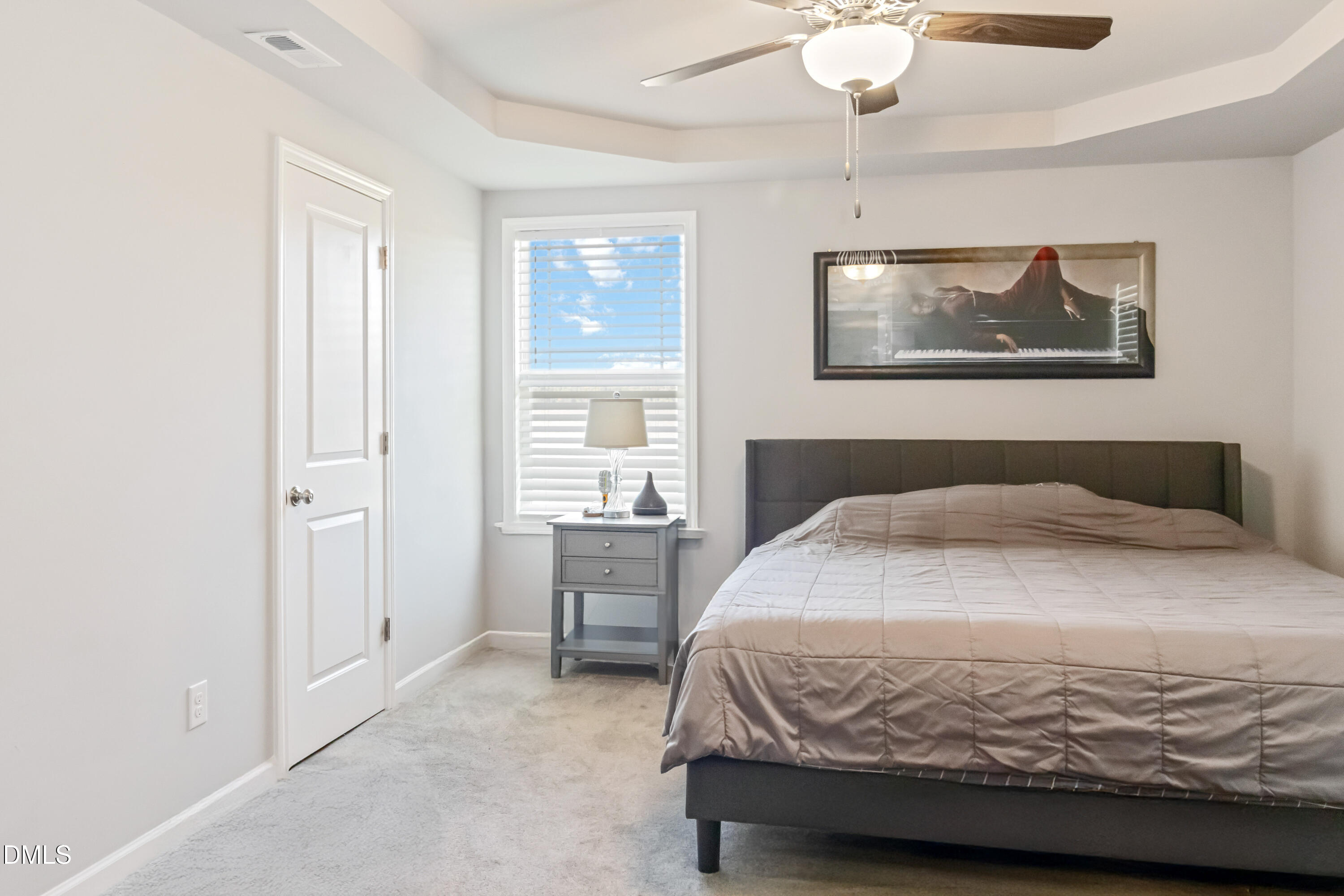 719 New Daniels Chapel Road Fremont, NC 27830 - Photo 13 of 24 a bedroom with a bed and a window