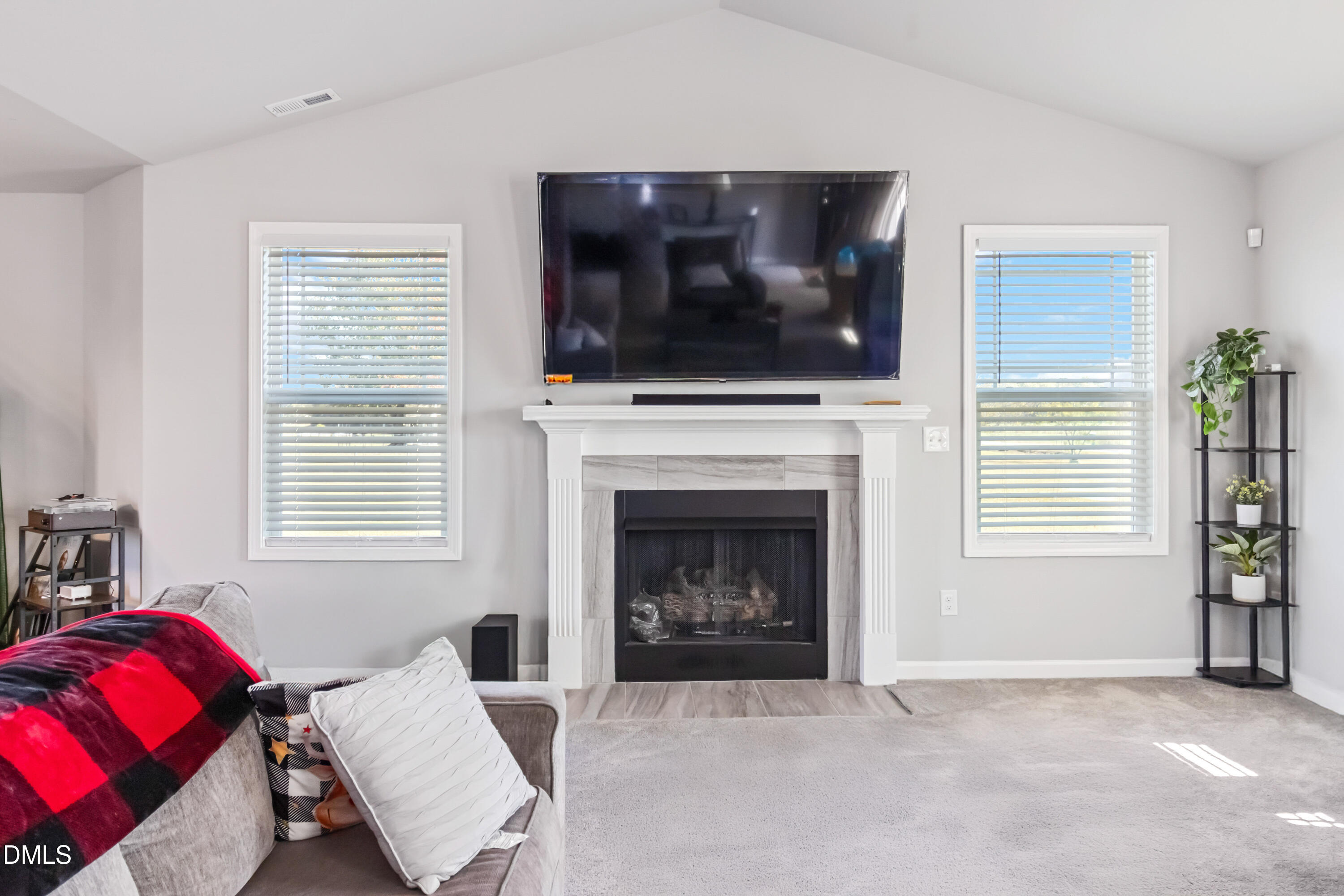 719 New Daniels Chapel Road Fremont, NC 27830 - Photo 2 of 24 a living room with furniture and a fireplace