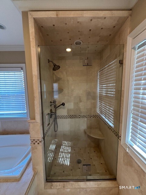 88 Maple Tree Avenue, Unit E Stamford, CT 06906 - Photo 30 of 50 a bathroom with a shower