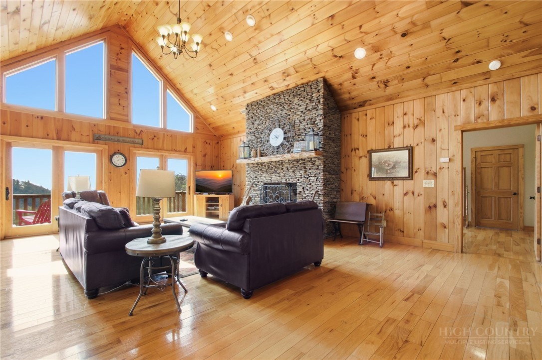 2081 Blackberry Road Boone, NC 28607 - Photo 14 of 45 a living room with furniture and a fireplace
