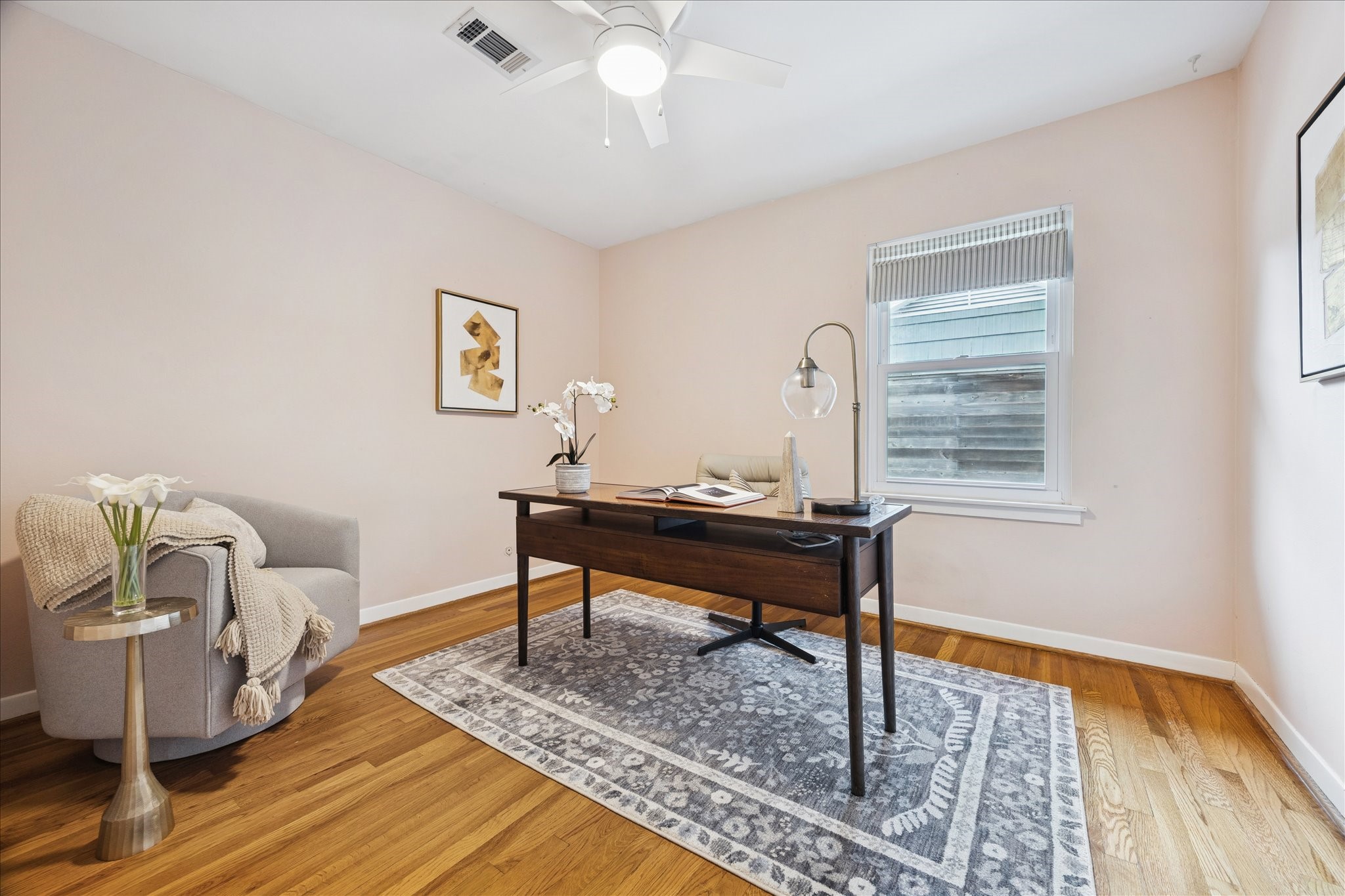 5234 Libbey Drive Houston, TX 77092 - Photo 25 of 35 Third bedroom with hardwood floors, window coverings and a ceiling fan.
