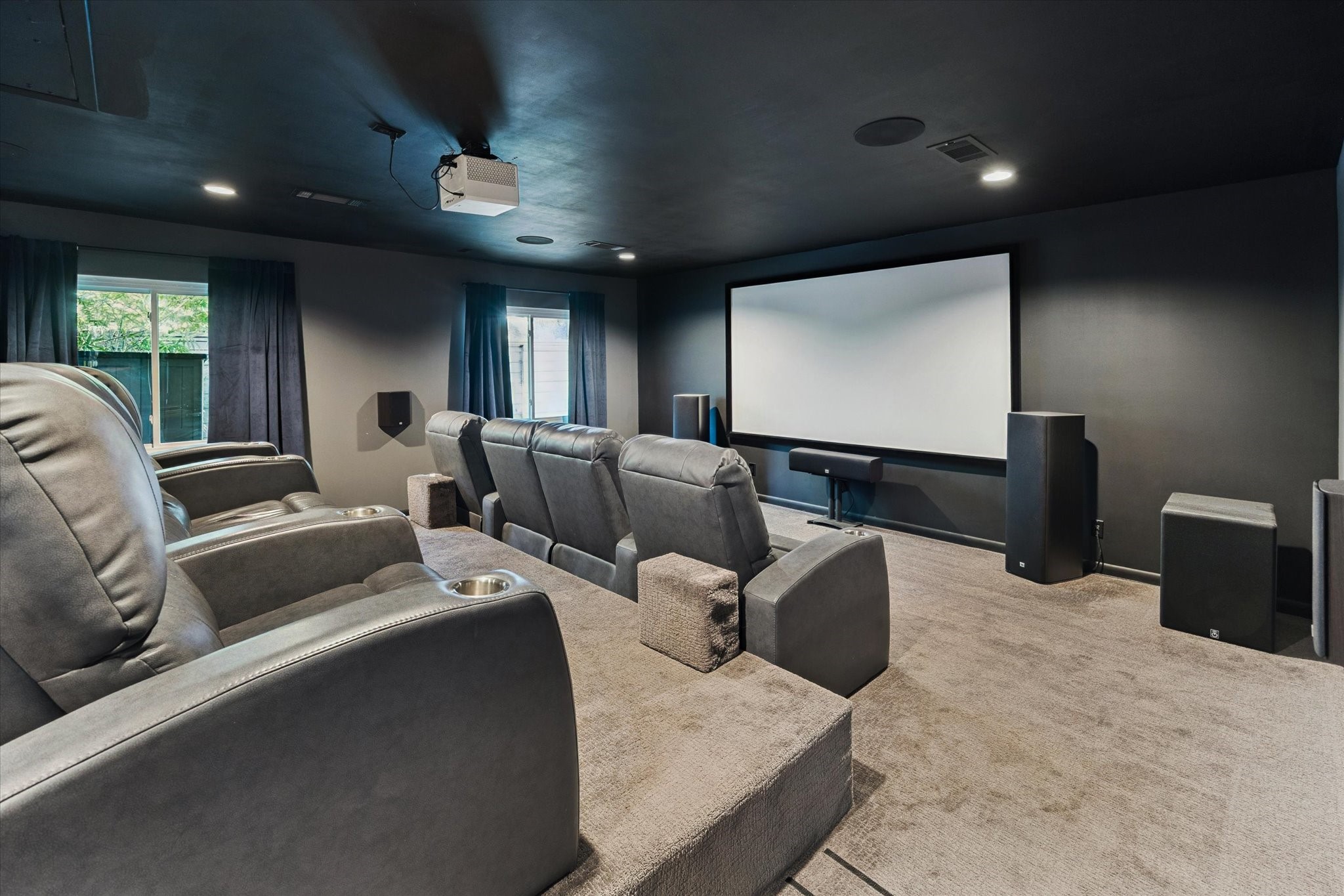 5234 Libbey Drive Houston, TX 77092 - Photo 26 of 35 This home theater was custom built in 2016 with new electrical installed and batt insulation and is wired for Atmos surround sound. Imagine all the fun nights with friends and loved ones watching movies in this room.