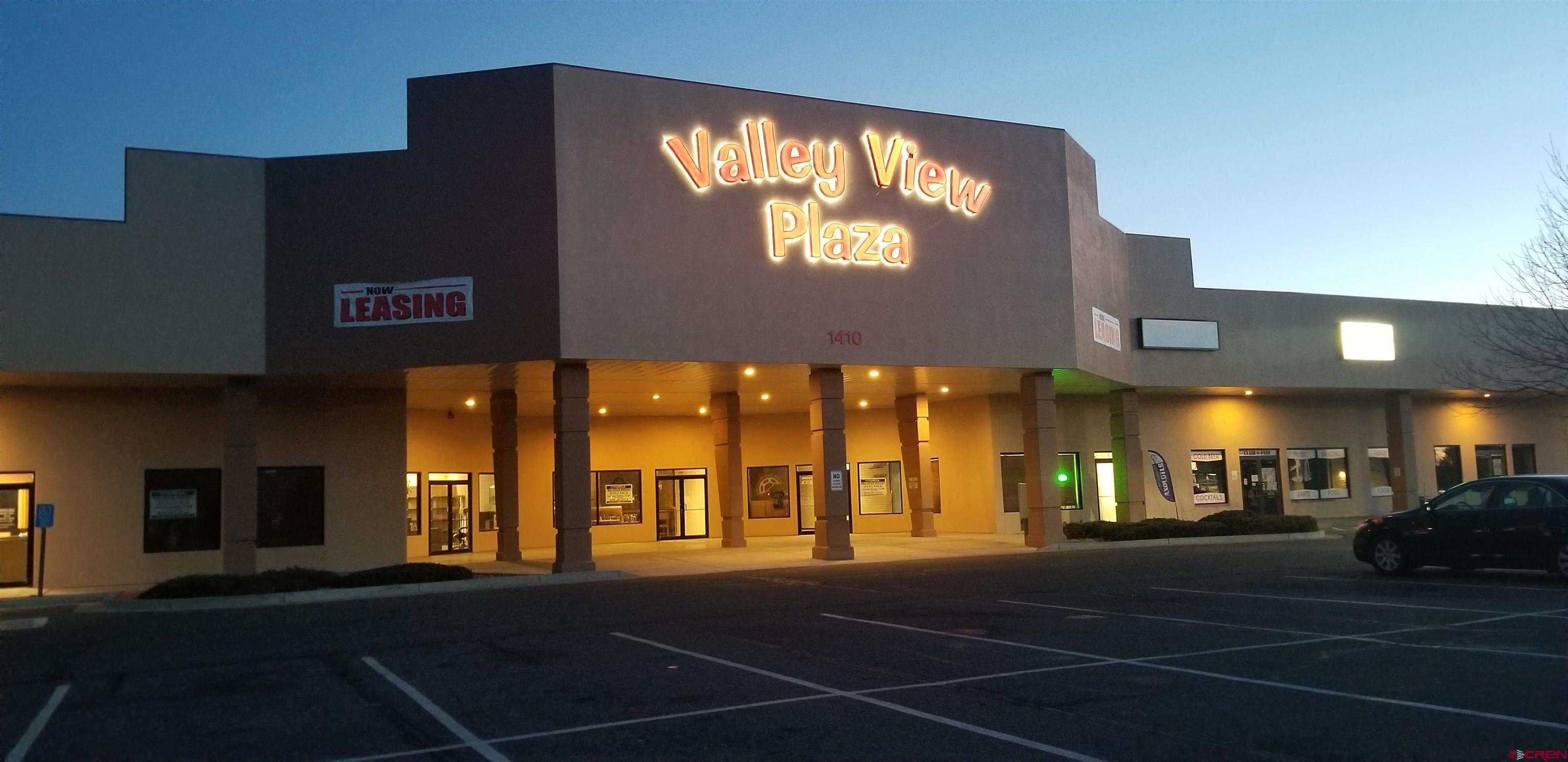 a view of a building with a street