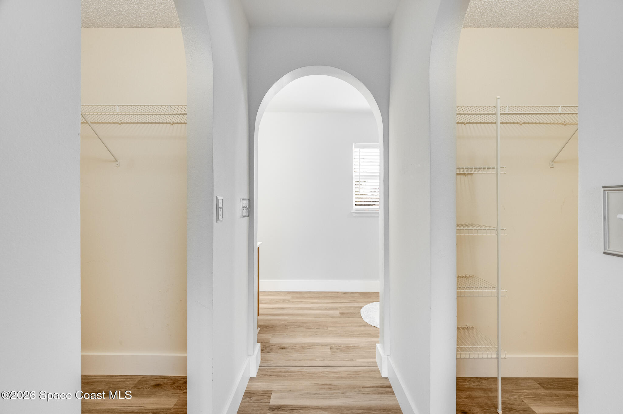 2250 Spring Creek Circle Palm Bay, FL 32905 - Photo 38 of 84 a view of a livingroom from a hallway