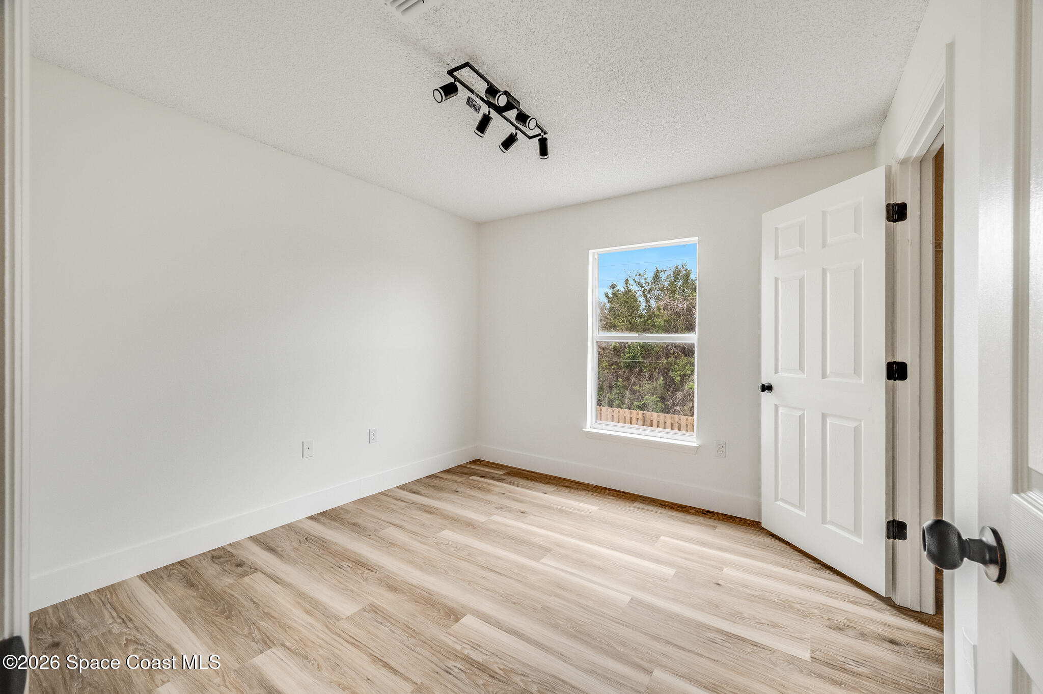 2250 Spring Creek Circle Palm Bay, FL 32905 - Photo 45 of 84 a view of a room that has a window in it