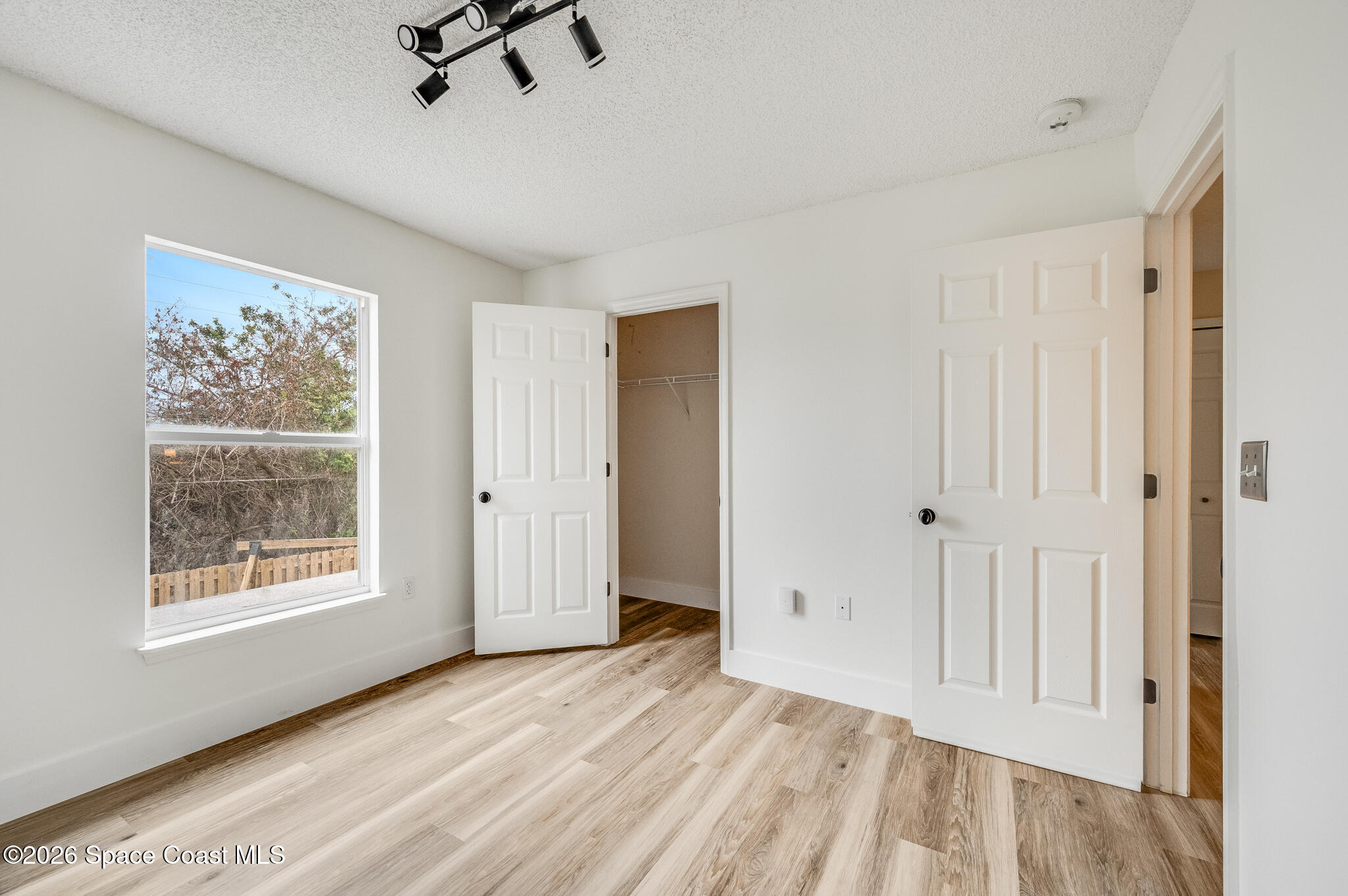 2250 Spring Creek Circle Palm Bay, FL 32905 - Photo 46 of 84 a view of an empty room with a window