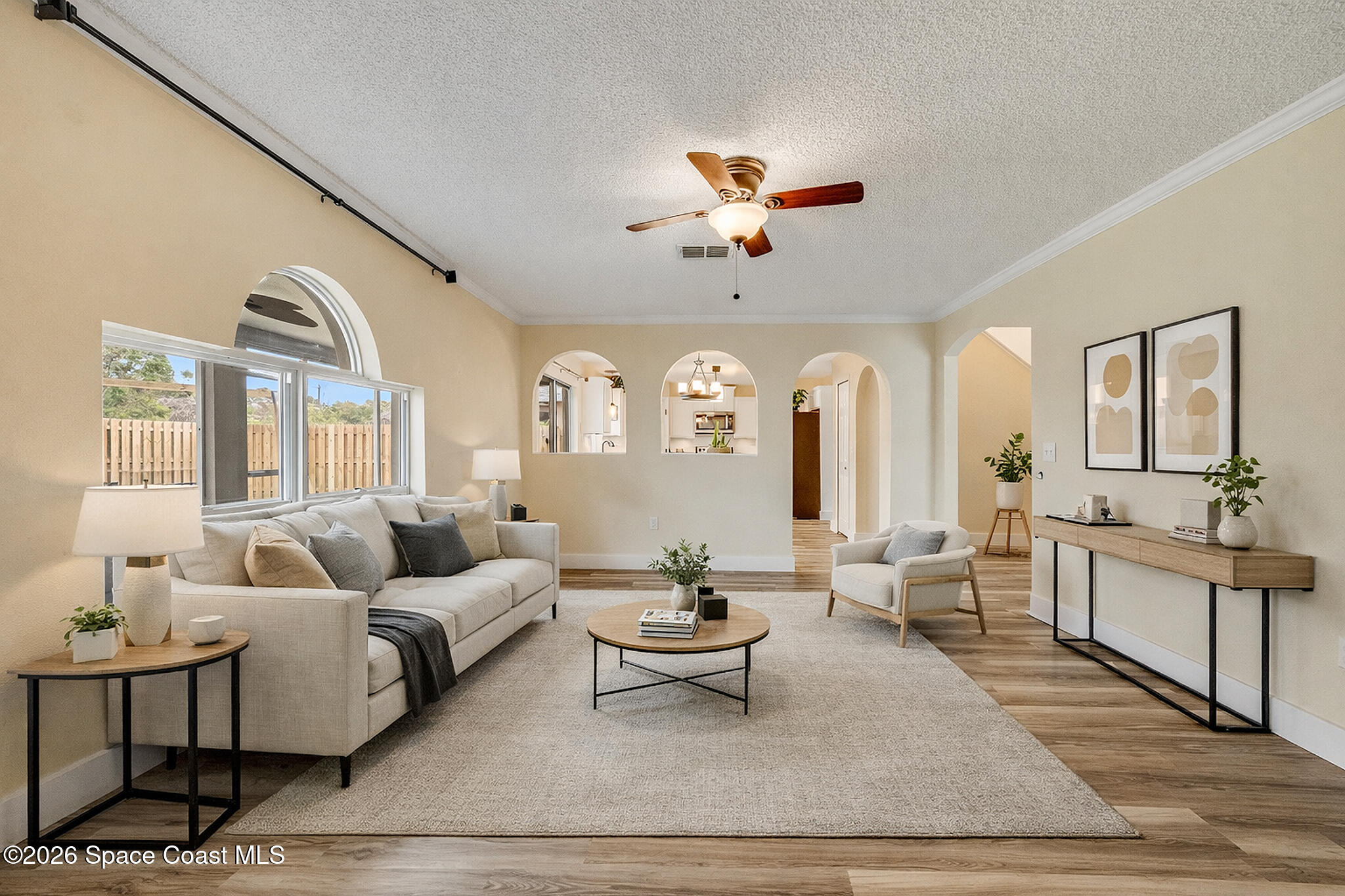 2250 Spring Creek Circle Palm Bay, FL 32905 - Photo 60 of 84 a living room with furniture