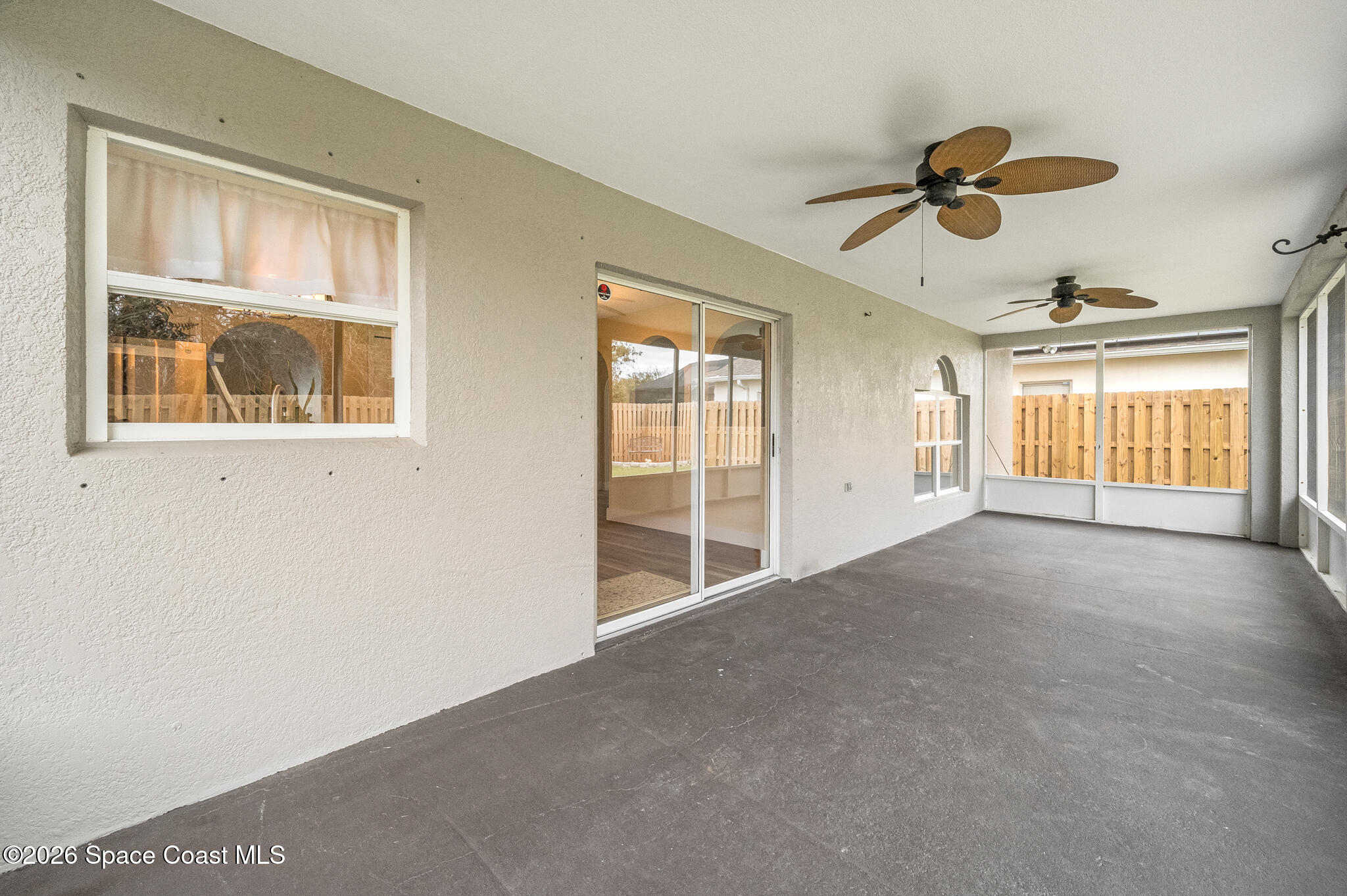2250 Spring Creek Circle Palm Bay, FL 32905 - Photo 68 of 84 a view of an empty room with a window