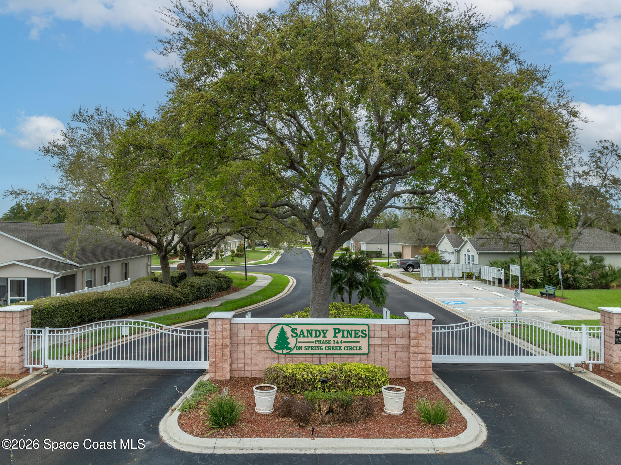 2250 Spring Creek Circle Palm Bay, FL 32905 - Photo 73 of 84 a front view of a house with garden