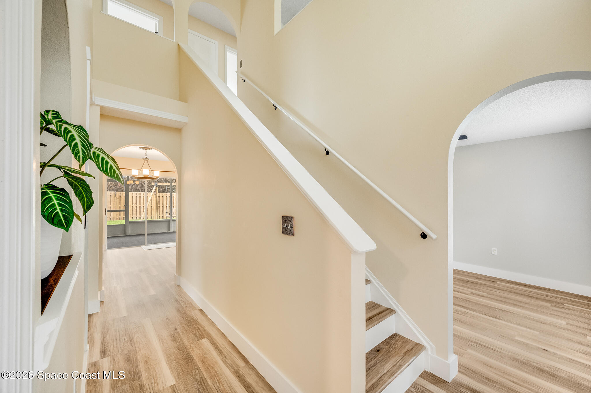 2250 Spring Creek Circle Palm Bay, FL 32905 - Photo 8 of 84 a view of entryway with wooden floor