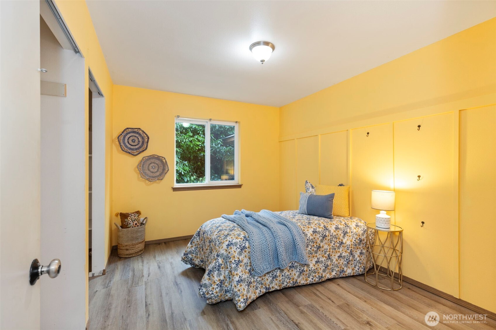 421 Northeast Cutlass Way Belfair, WA 98528 - Photo 18 of 35 a bedroom with a bed and a window