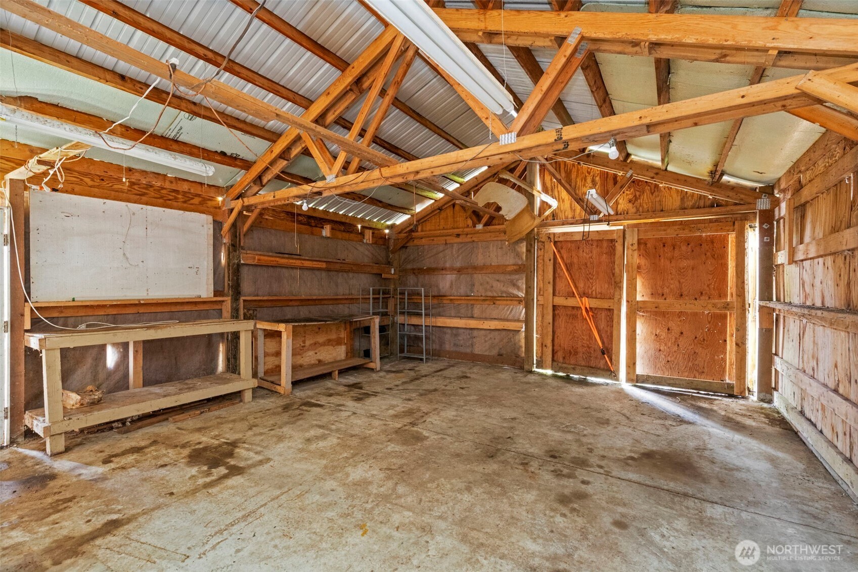 421 Northeast Cutlass Way Belfair, WA 98528 - Photo 27 of 35 a view of an empty room with a staircase