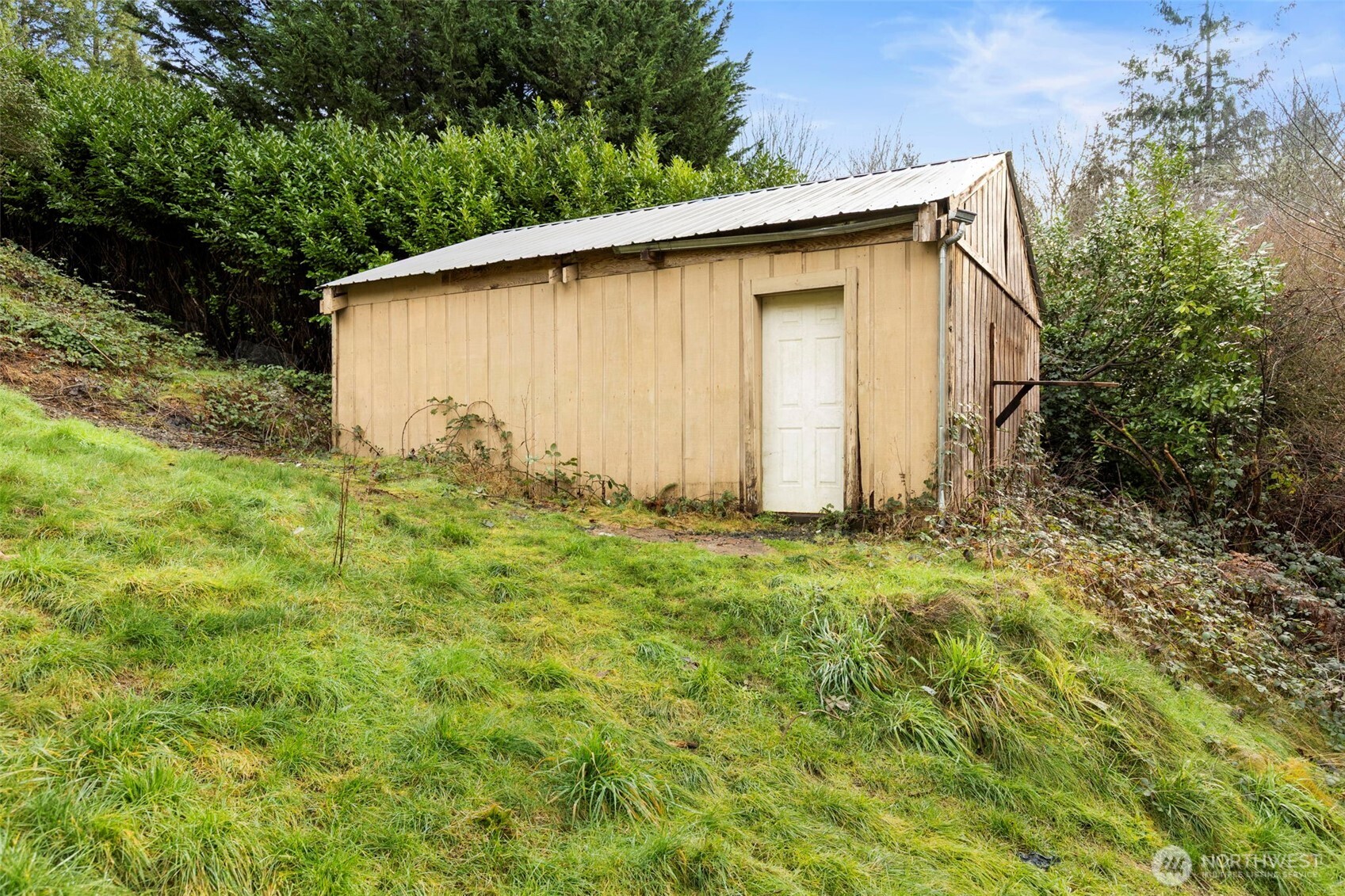 421 Northeast Cutlass Way Belfair, WA 98528 - Photo 29 of 35 a view of a backyard