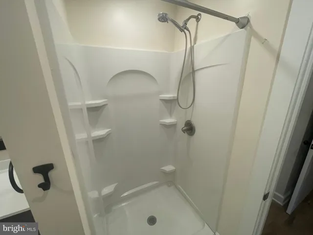 a bathroom with a bath tub