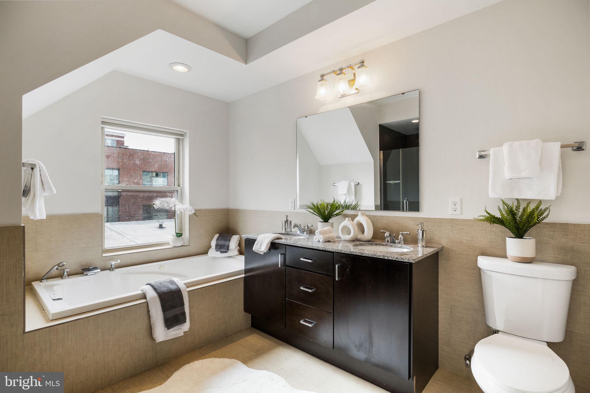 2140 Carpenter Street Philadelphia, PA 19146 - Photo 26 of 41 a room with a sink cabinets and a wooden floor