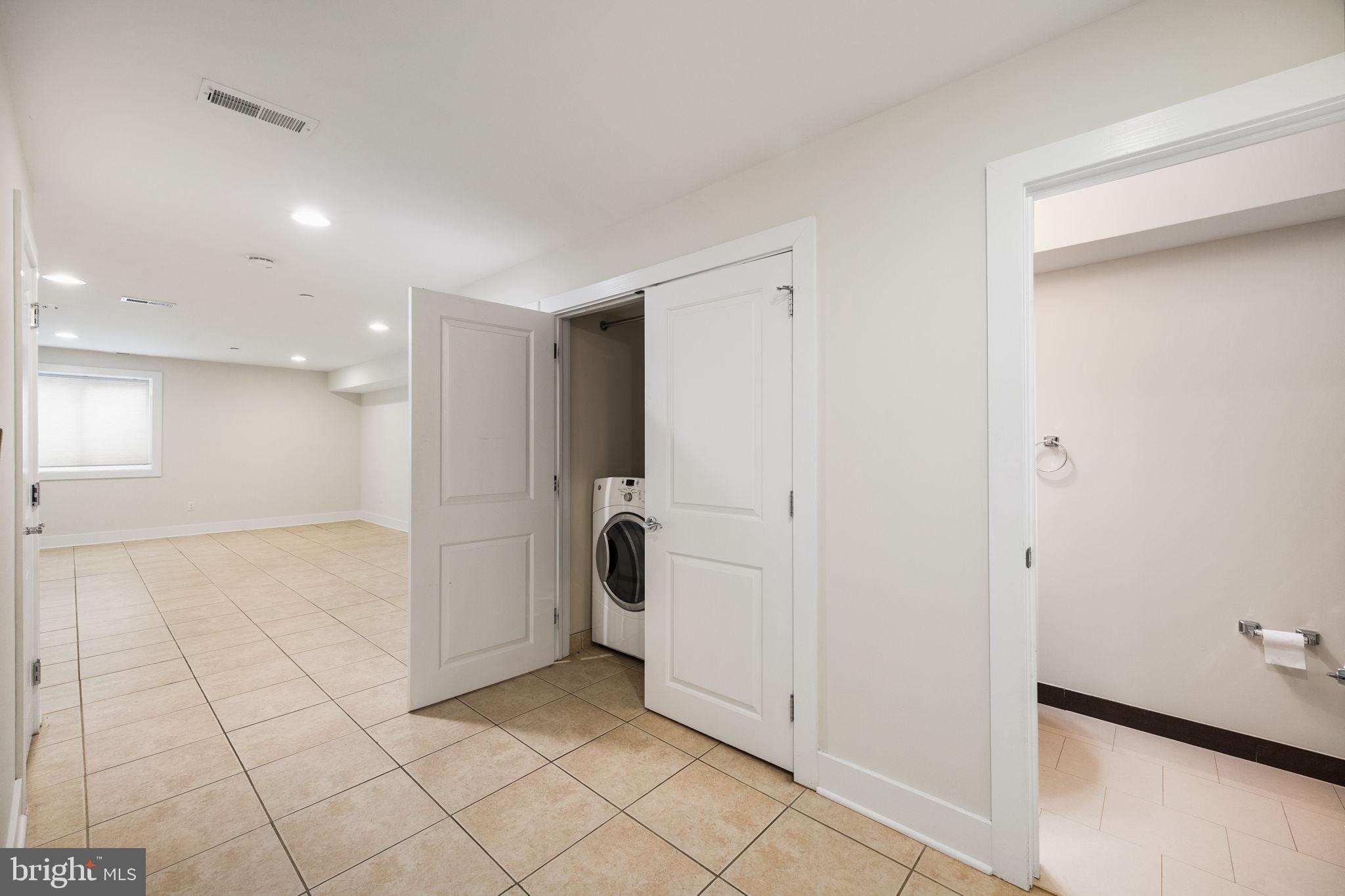 2140 Carpenter Street Philadelphia, PA 19146 - Photo 34 of 41 a view of a hallway to closet and utility room