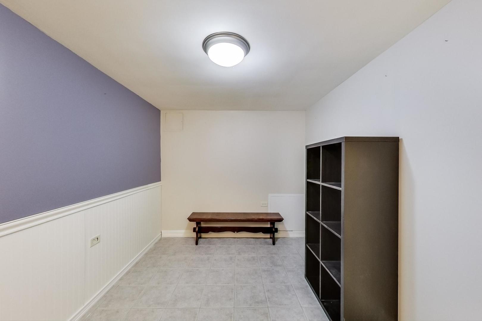 2717 West Rascher Avenue Chicago, IL 60625 - Photo 15 of 37 a view of room with stairs and a closet