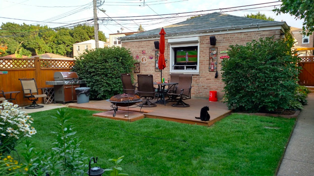 2717 West Rascher Avenue Chicago, IL 60625 - Photo 34 of 37 a view of a backyard with sitting area and garden