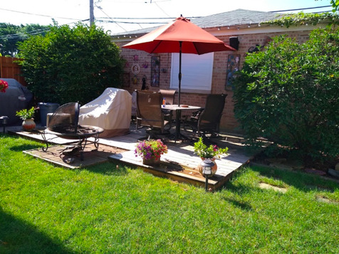 2717 West Rascher Avenue Chicago, IL 60625 - Photo 37 of 37 a view of a backyard with chairs and a patio