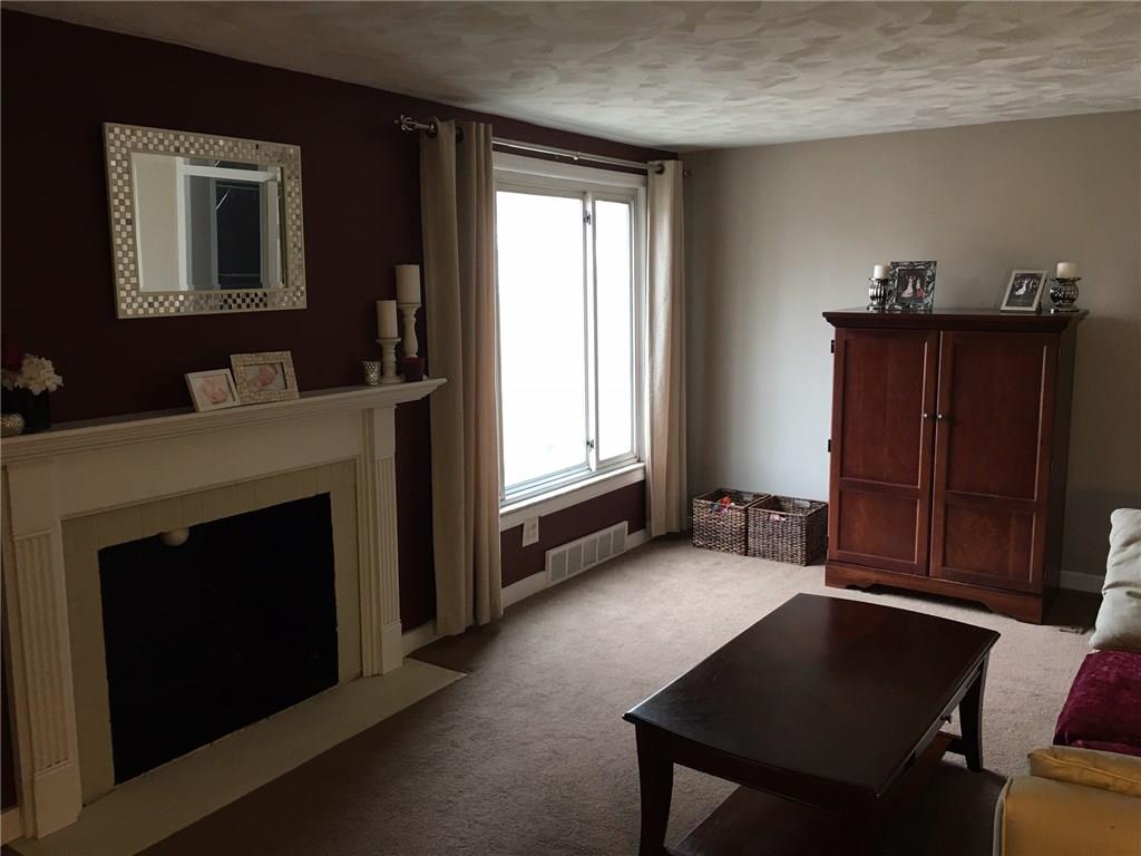 121 Rockingham Road Pittsburgh, PA 15238 - Photo 3 of 23 Living Room - Freshly Painted, Decorative Fireplace and Mantle.